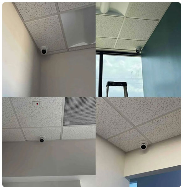 Ceiling-mounted surveillance cameras in a dental clinic, enhancing security and monitoring capabilities for patient safety and clinic operations.