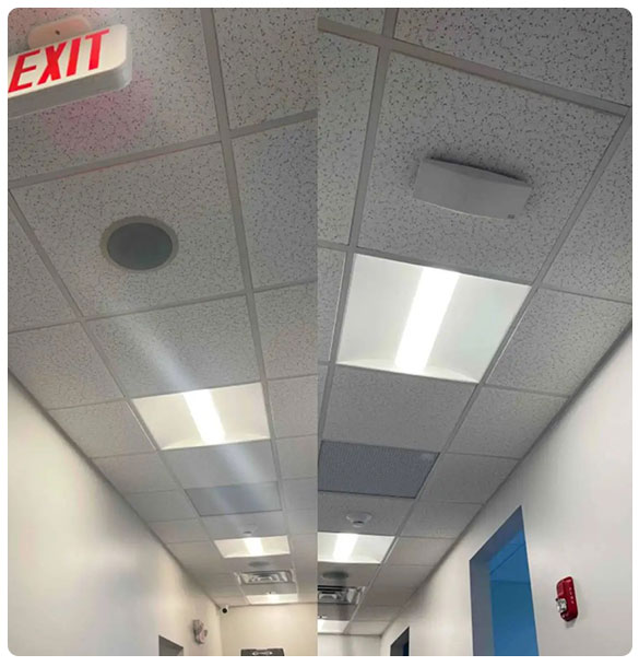 Ceiling view showing integrated audio system speaker and LED lighting in Newnan Dental Studio, enhancing patient experience and clinic ambiance.