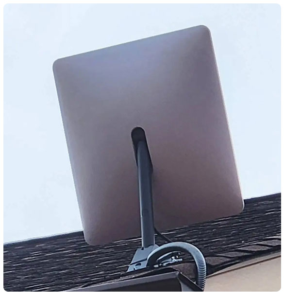 Starlink satellite dish mounted on a roof for high-speed internet access, part of SAV Systems' comprehensive networking suite installation for Standridge Color Corp.